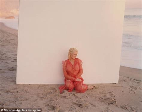 <strong>Christina Aguilera</strong> wore a colorful dress from the winter collection of London-based designer Feben Thursday. . Chriatina aguilera nude